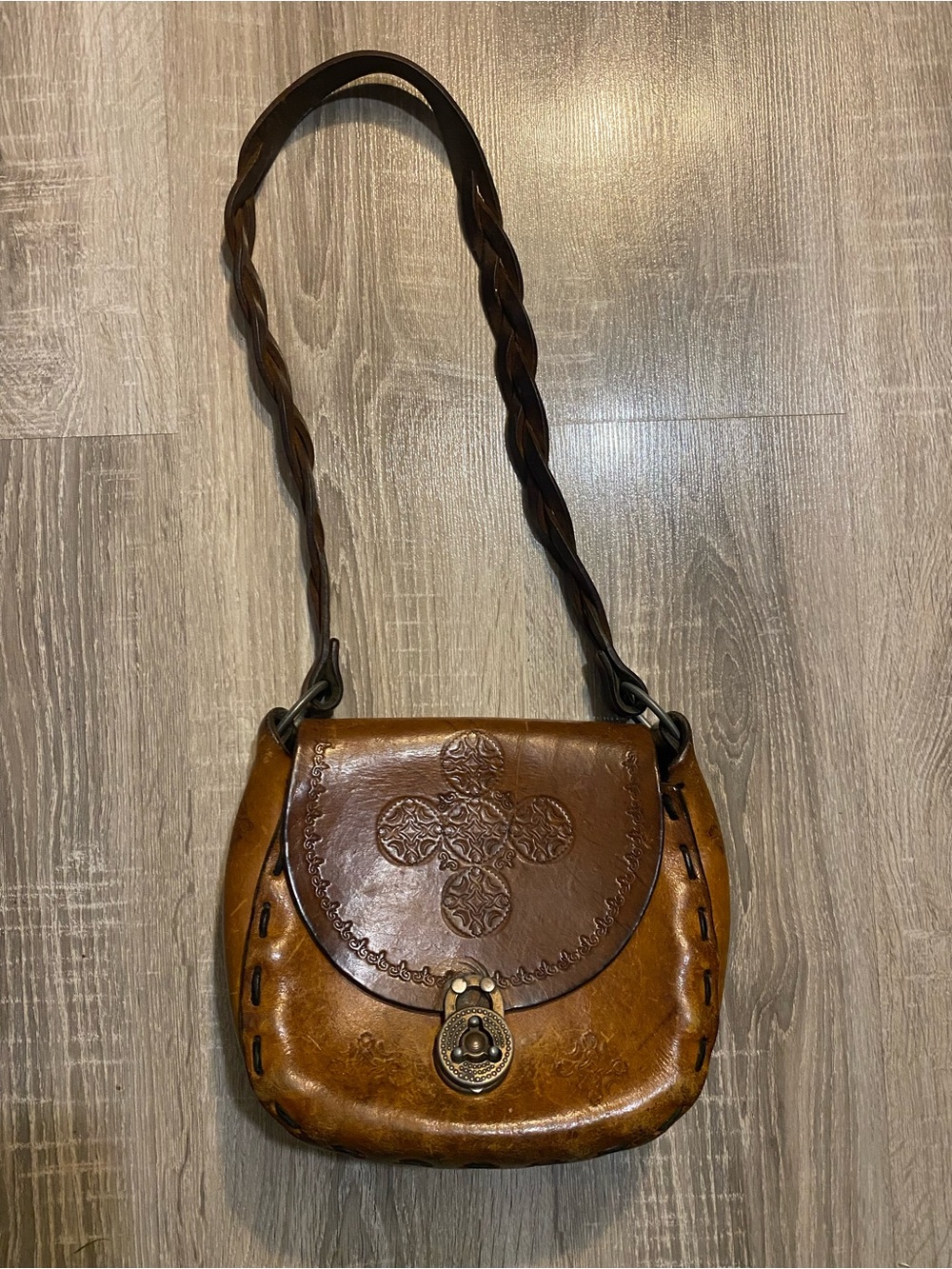 Vintage Handcrafted Brown Leather Crossbody Bag with Braided Strap